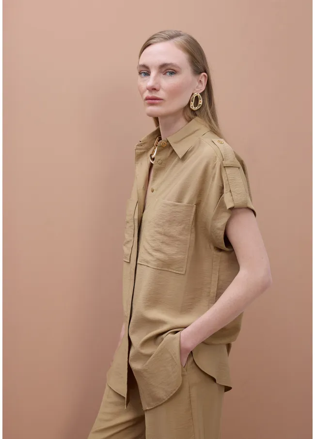 Camisa sin mangas bolsillos