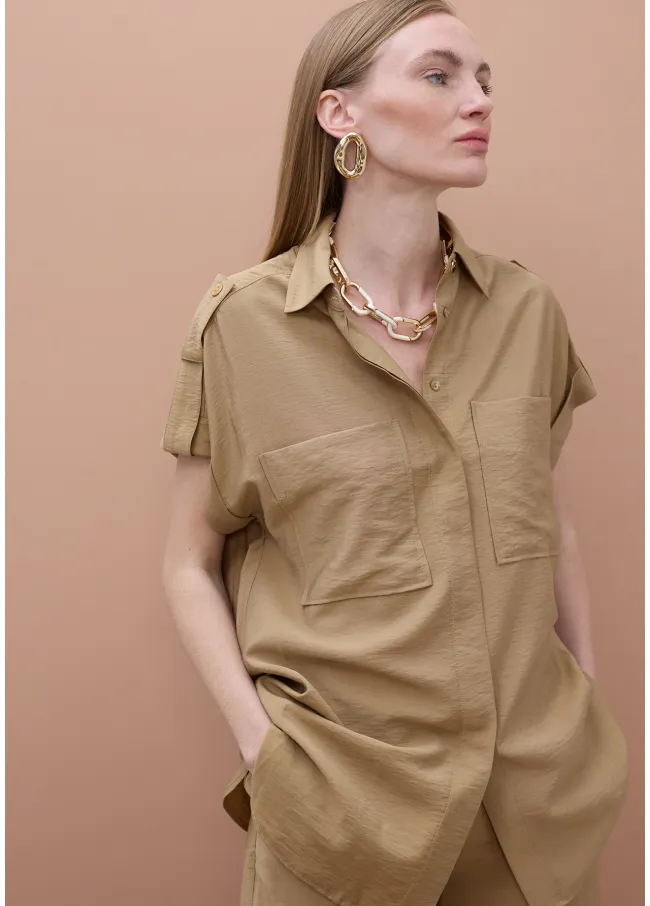Camisa sin mangas bolsillos