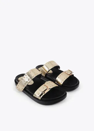 Flat sandals with straps and metal details