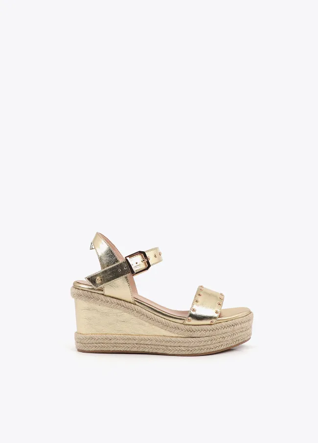 Wedges with raffia-effect sole and metal details
