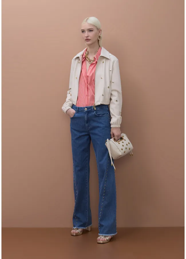 Cazadora blanca con tachas