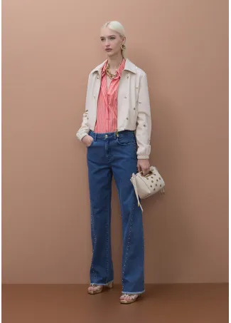 Cazadora blanca con tachas