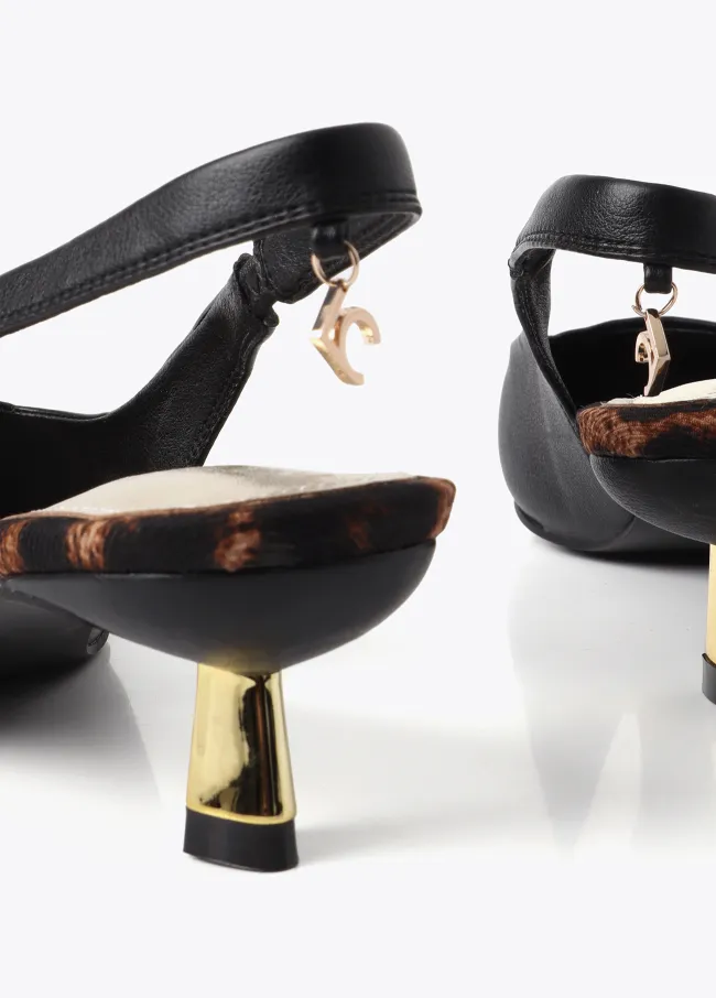 Zapato tacón destalonado con tachas combinadas