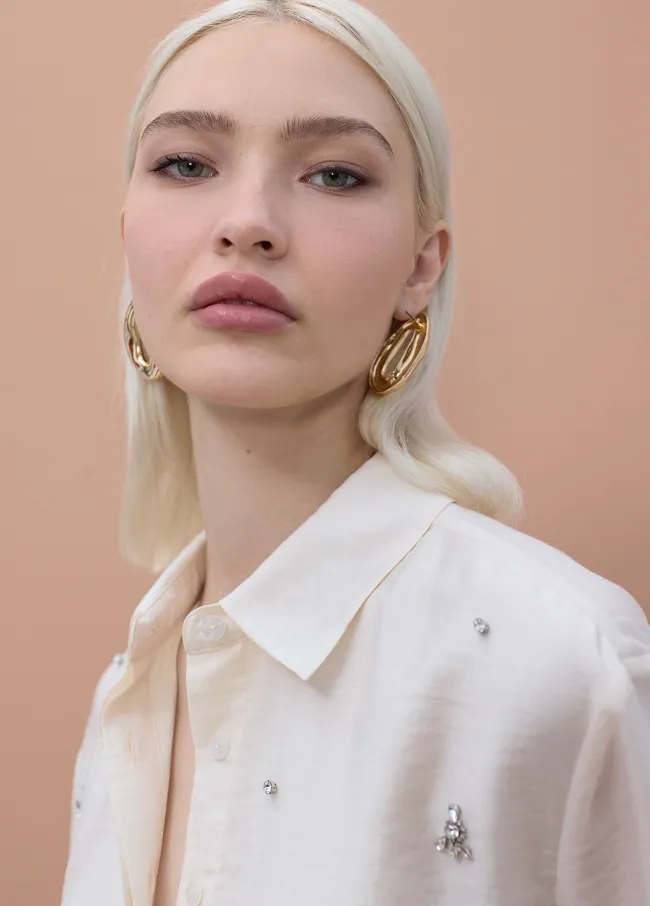 Long shirt with rhinestone appliqués