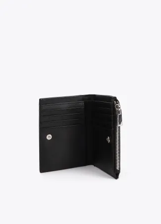 Purse with gold and silver-toned studs