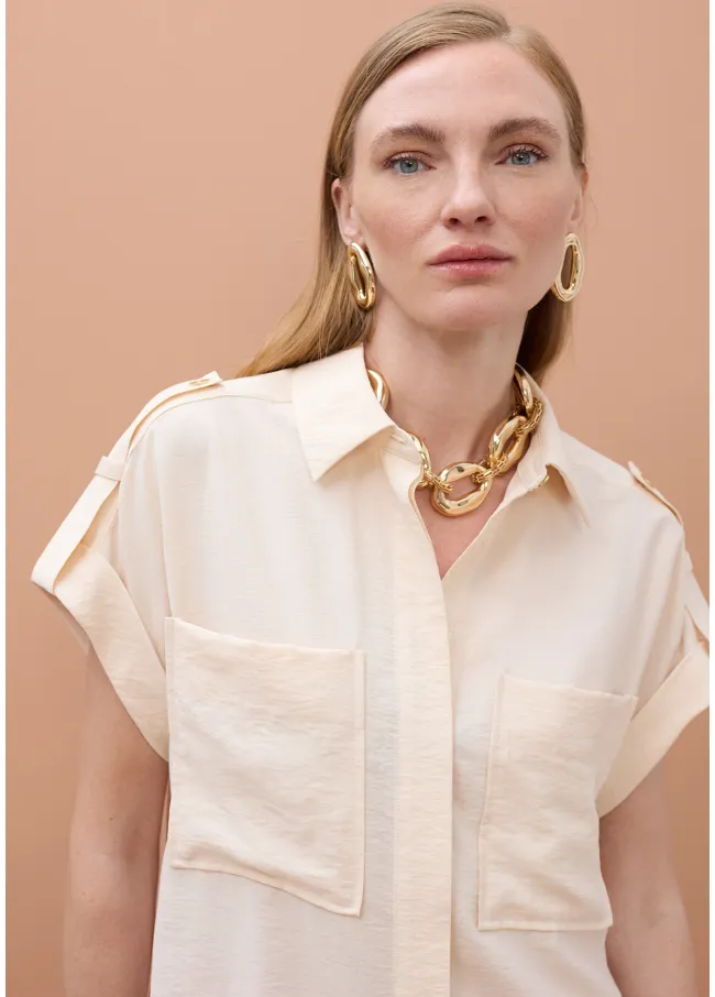 Camisa sin mangas bolsillos