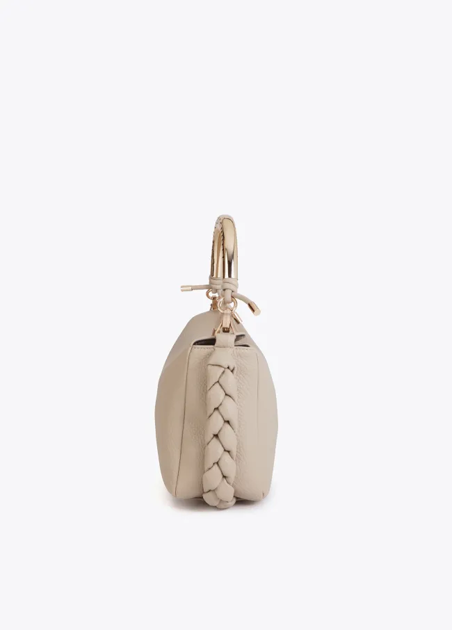 Cutwork crossbody bag with metal handle