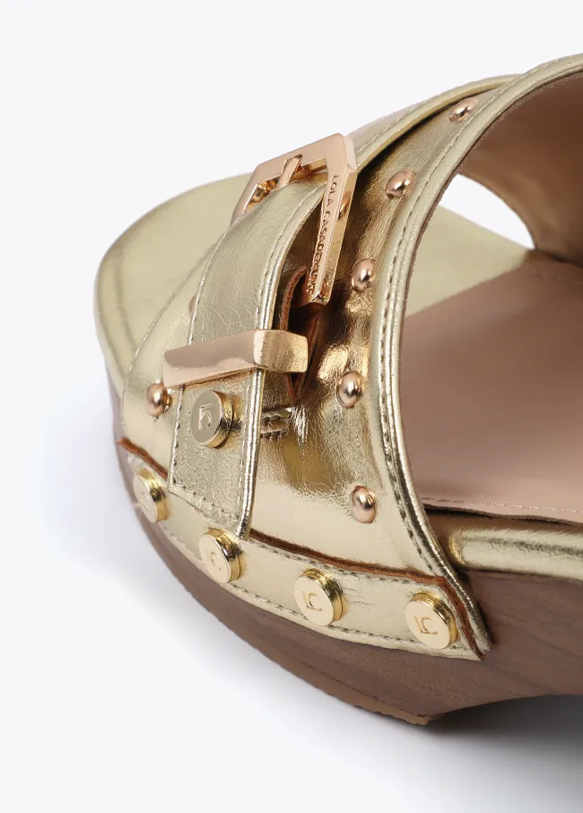 Clogs with metal details