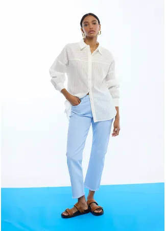 Flared trousers with buttons