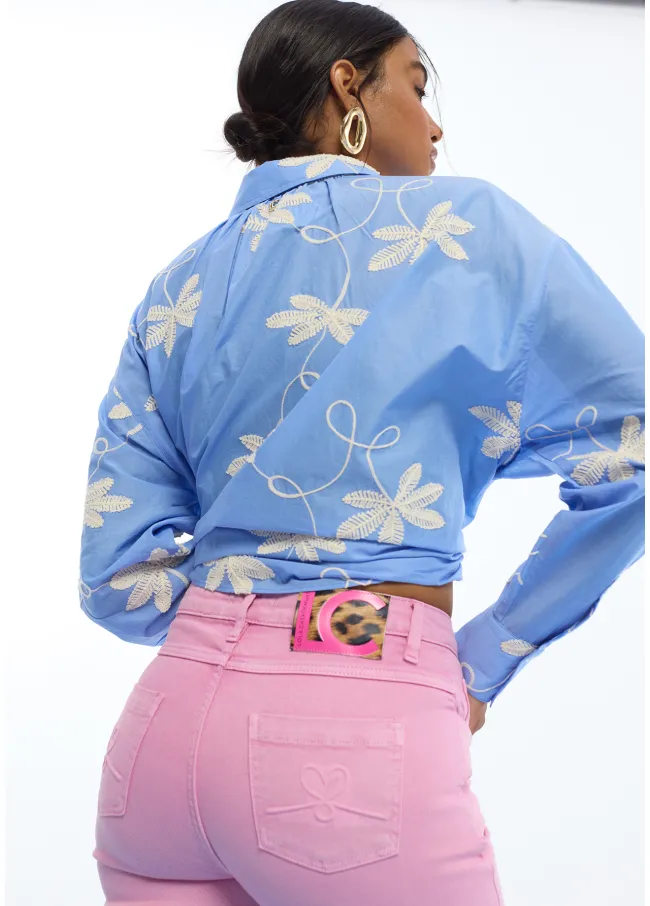Flared trousers with buttons