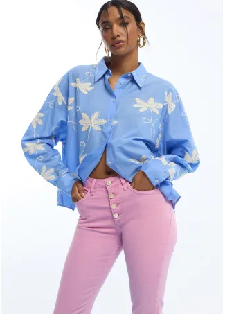 Flared trousers with buttons