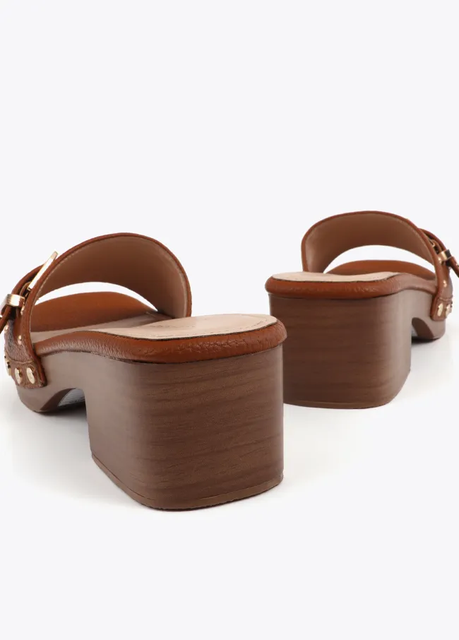 Clogs with metal details