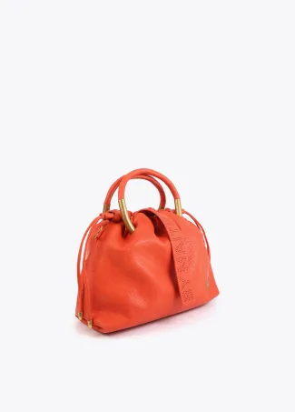Faux leather bag with round metal handle