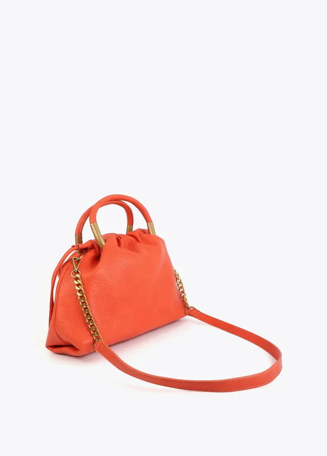 Faux leather bag with round metal handle