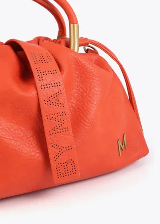 Faux leather bag with round metal handle