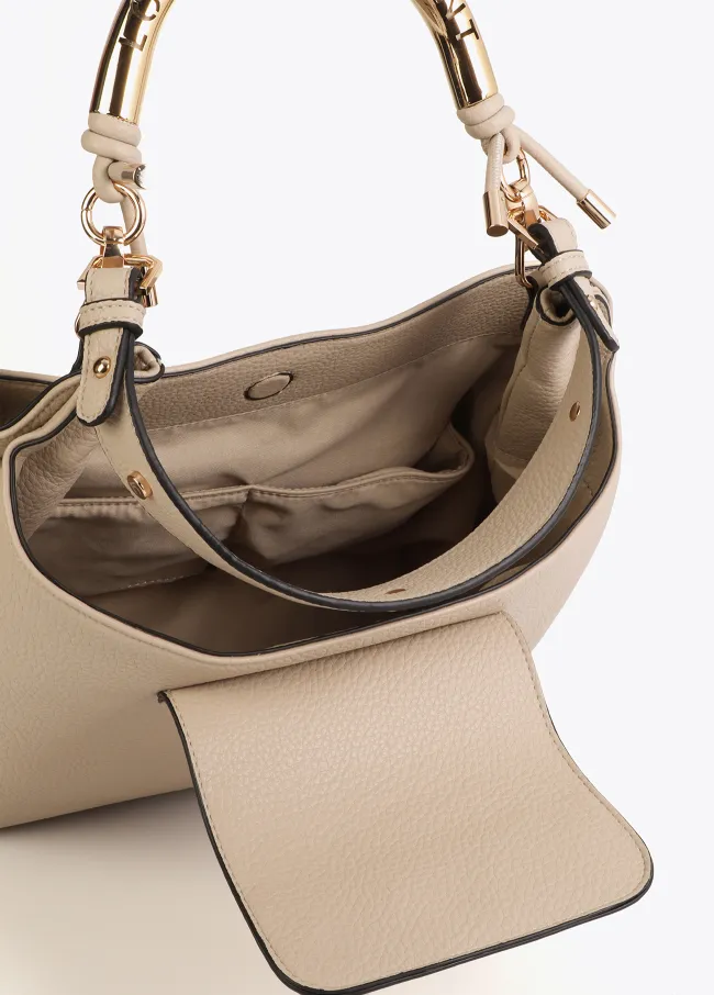 Cutwork tote bag with metal handle