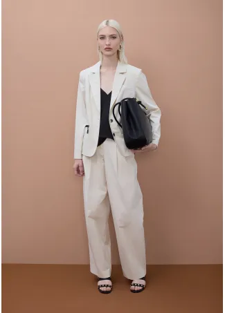 Fitted blazer with visible lacquered zips