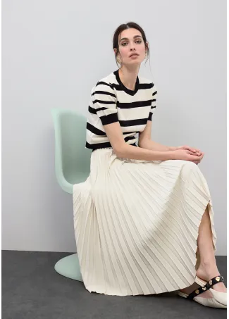 Asymmetric pleated skirt