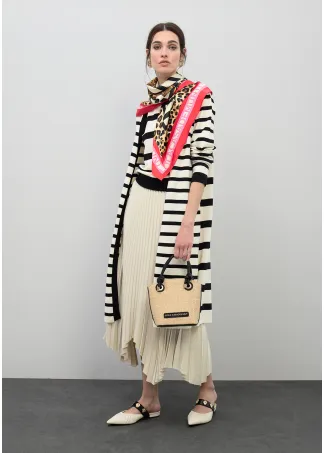 Asymmetric pleated skirt