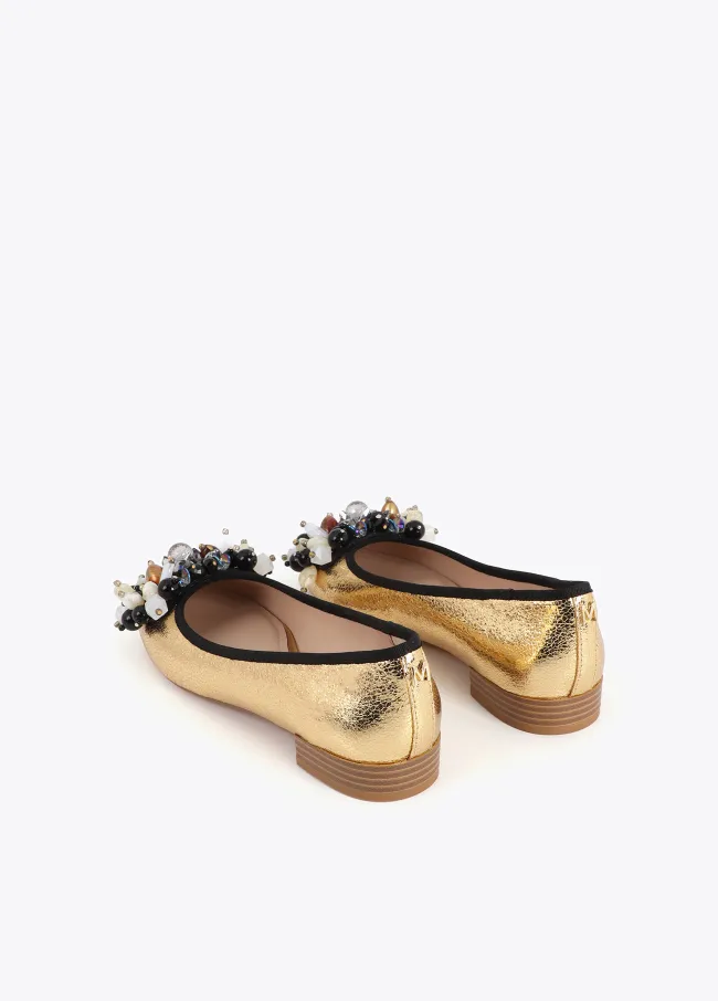 Metallic ballet flats with appliqué details