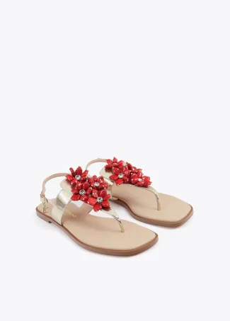 Metallic flat sandals with floral details