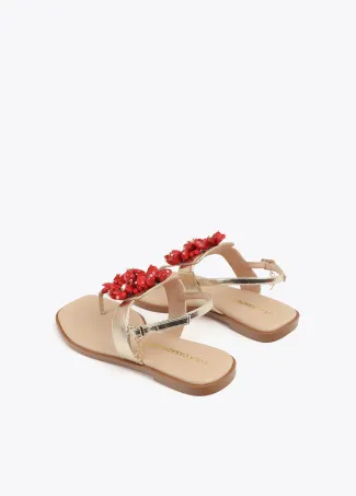 Sandalia plana metalizada con detalle flores