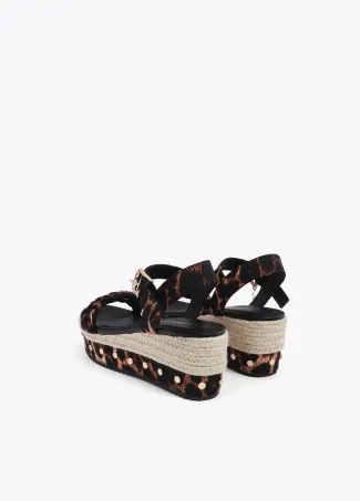 Wedges with braided strap and metal details