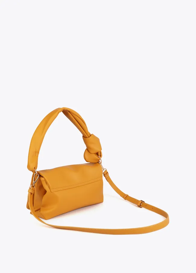 Crossbody bag with knotted strap
