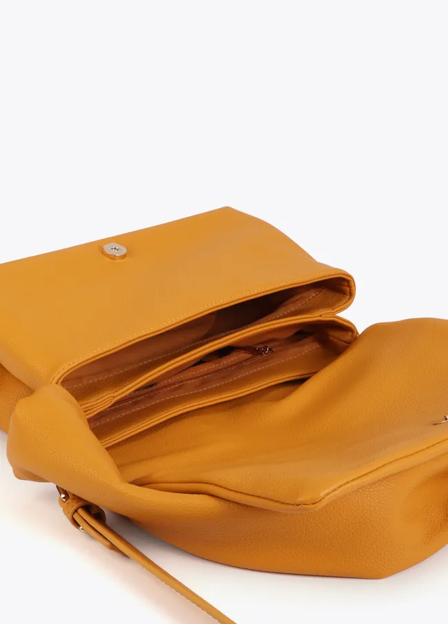 Crossbody bag with knotted strap