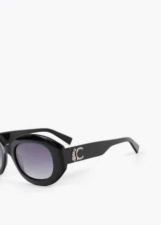 Round sunglasses with leopard logo