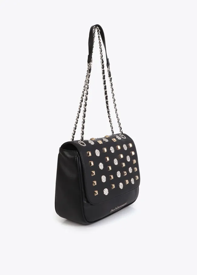 Bandolera con solapa con tachas oro y plata