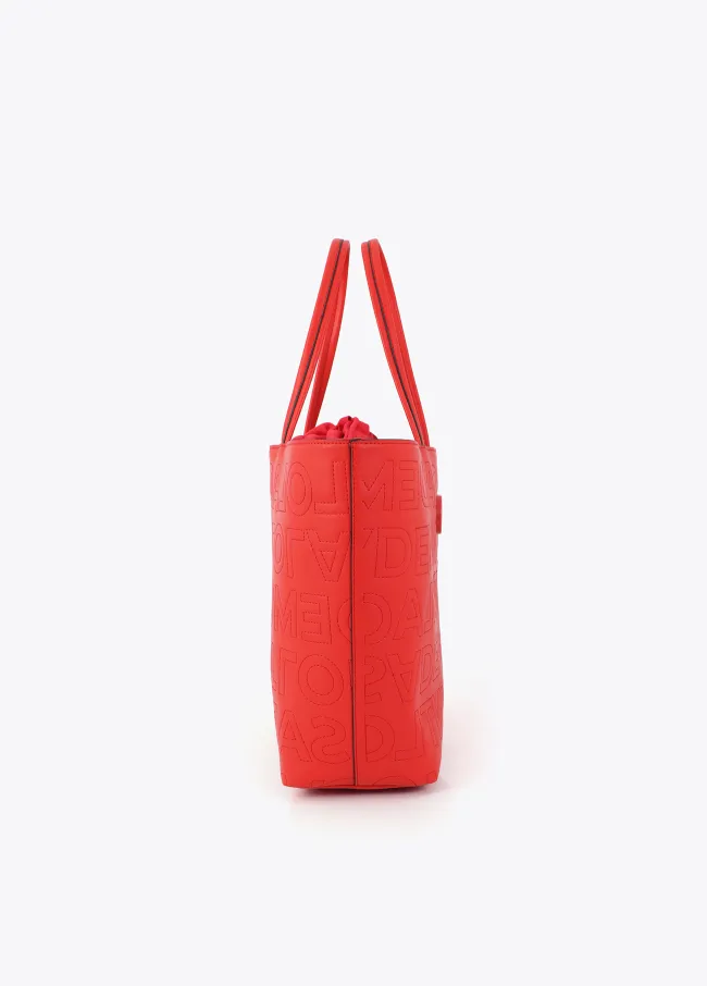 Deconstructed tote bag with monogram topstitching