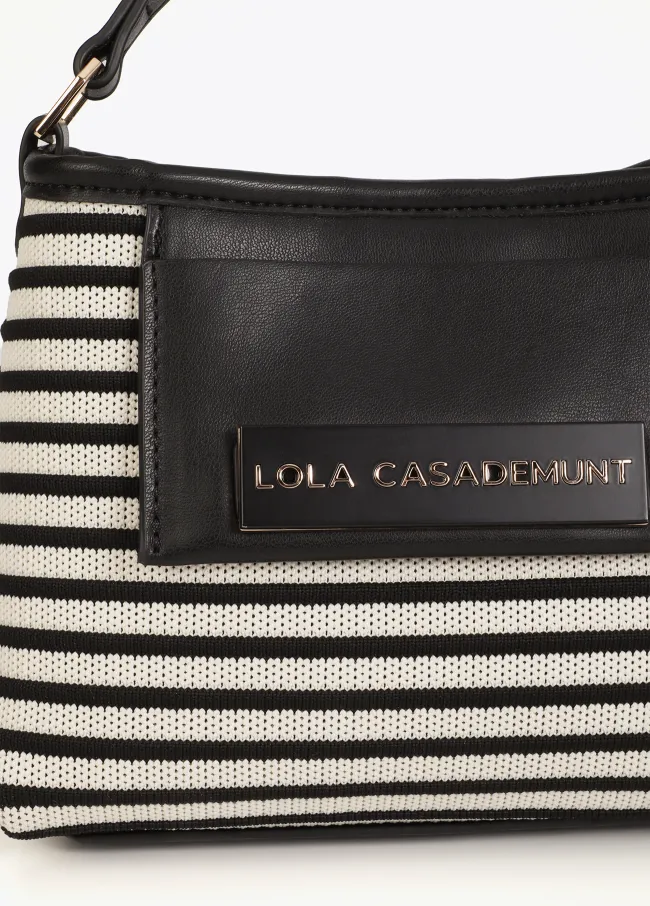 Contrast striped fabric and faux leather...
