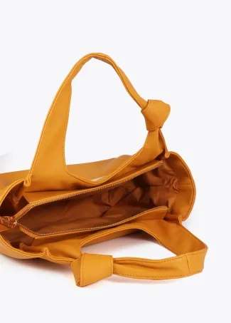 Tote bag with knotted strap