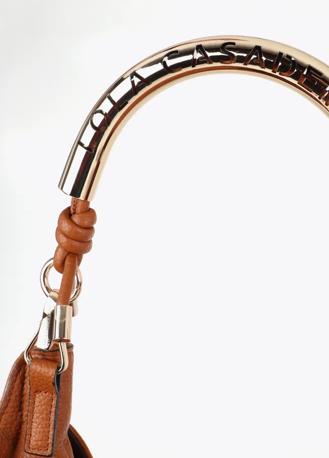 Cutwork tote bag with metal handle