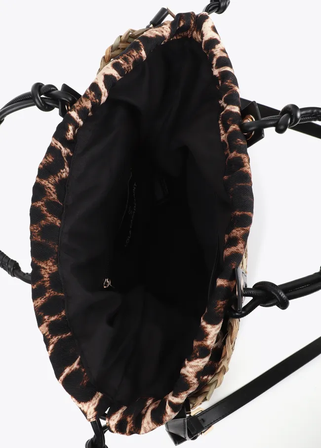 Mini tote bag with cutwork logo on the strap