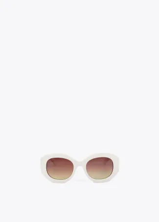 Round sunglasses with leopard logo