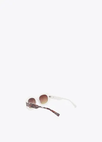 Round sunglasses with leopard logo
