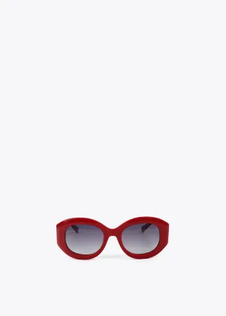 Round sunglasses with leopard logo