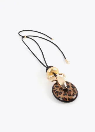 Long necklace with contrast animal print and gold-toned pendant