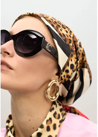 Round sunglasses with leopard logo