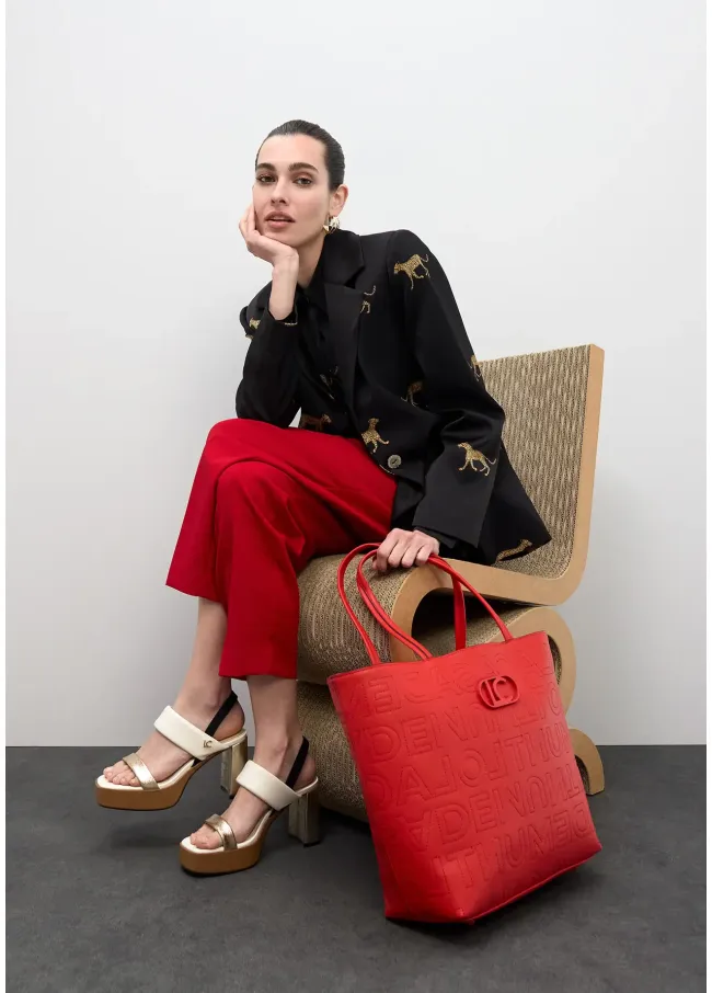 Deconstructed tote bag with monogram topstitching