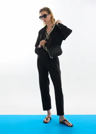 Pantalón scuba y strass lateral