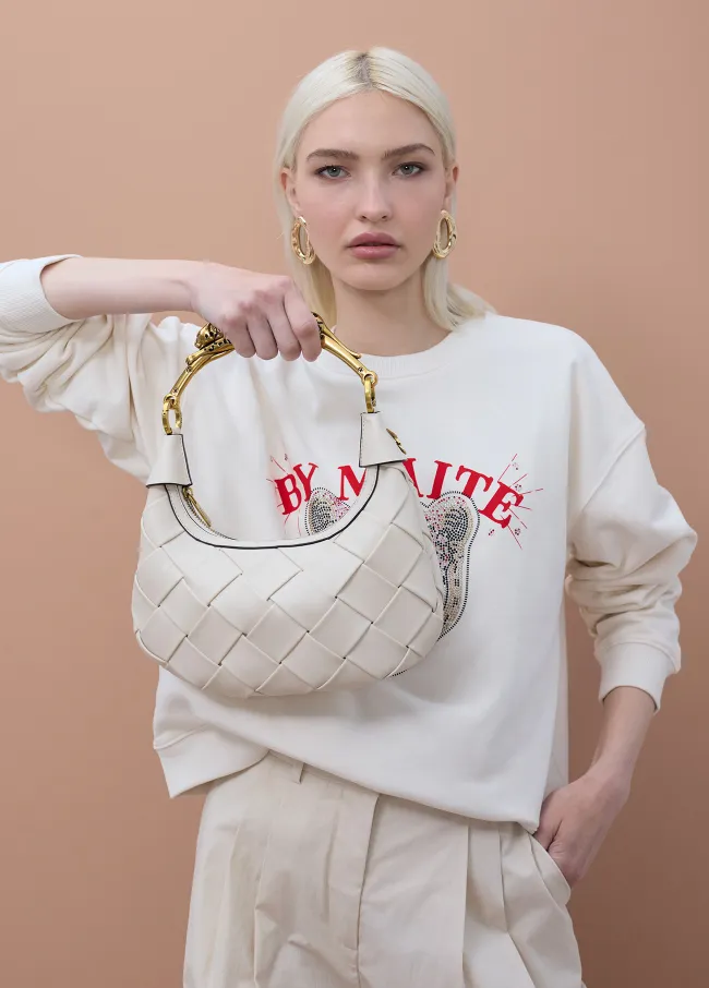 Braided half-moon bag with leopard strap