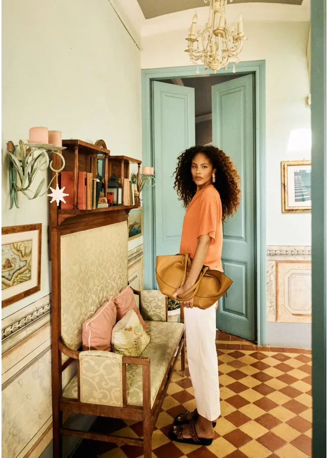 Cape blouse with drop sleeves