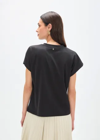 Camiseta loro con plumas