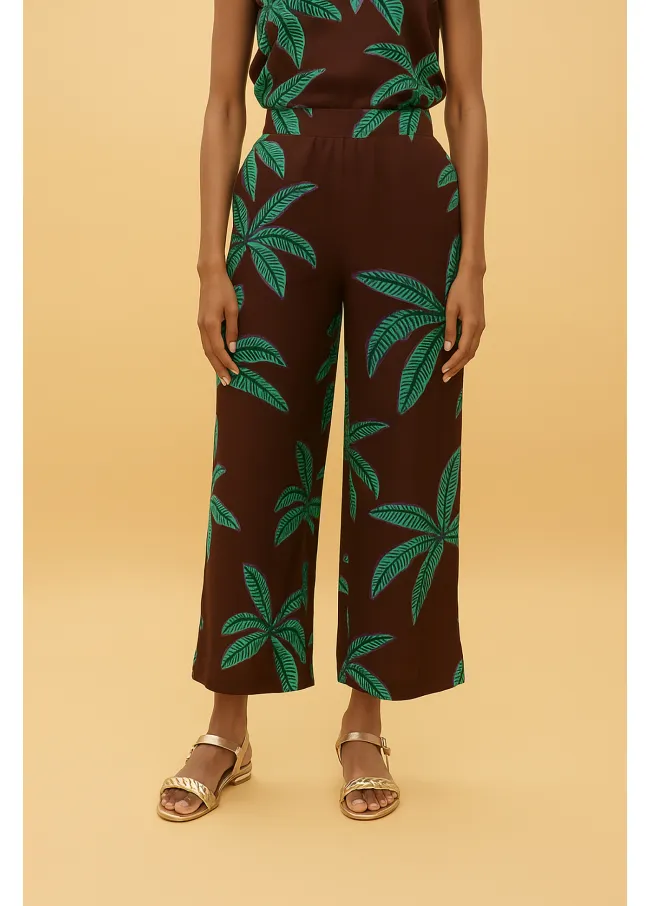 Pantalon fondo marron palmeras