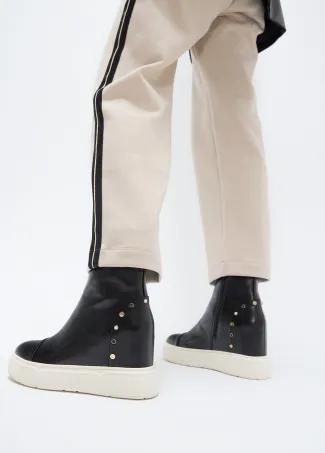 Platform ankle boot with inner wedge studs on heel