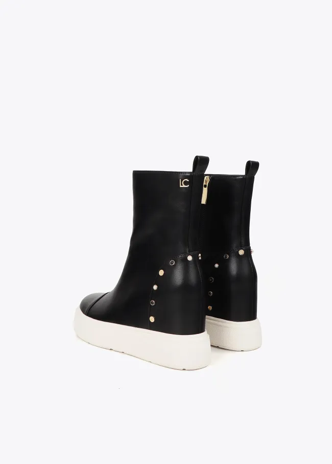 Platform ankle boot with inner wedge studs on heel